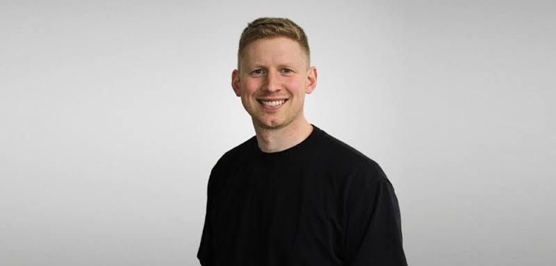Jack Mellor, CEO of Personnel Checks, pictured against a light grey background.