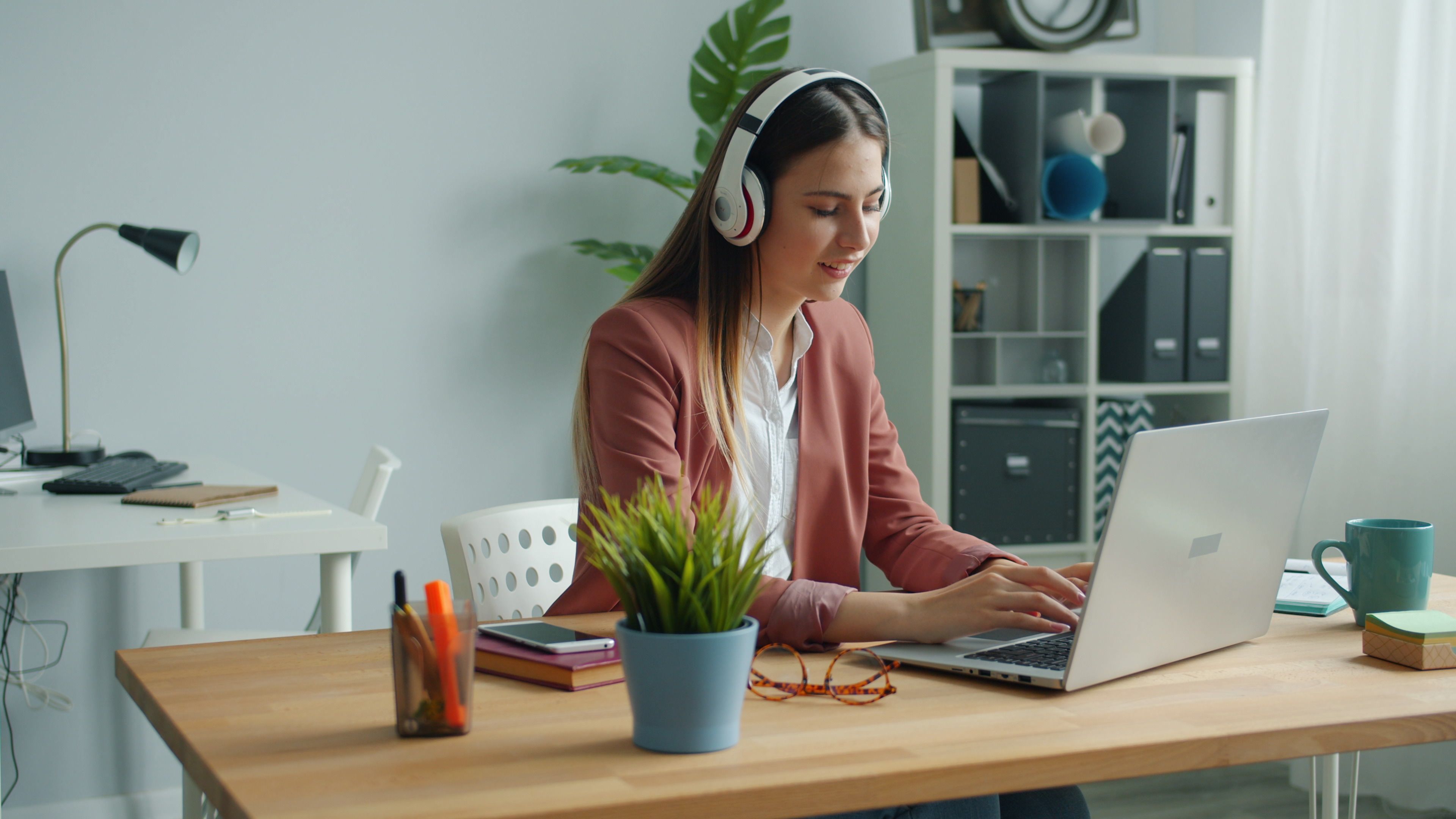 Remote work salary expectations Professional working remotely on a laptop