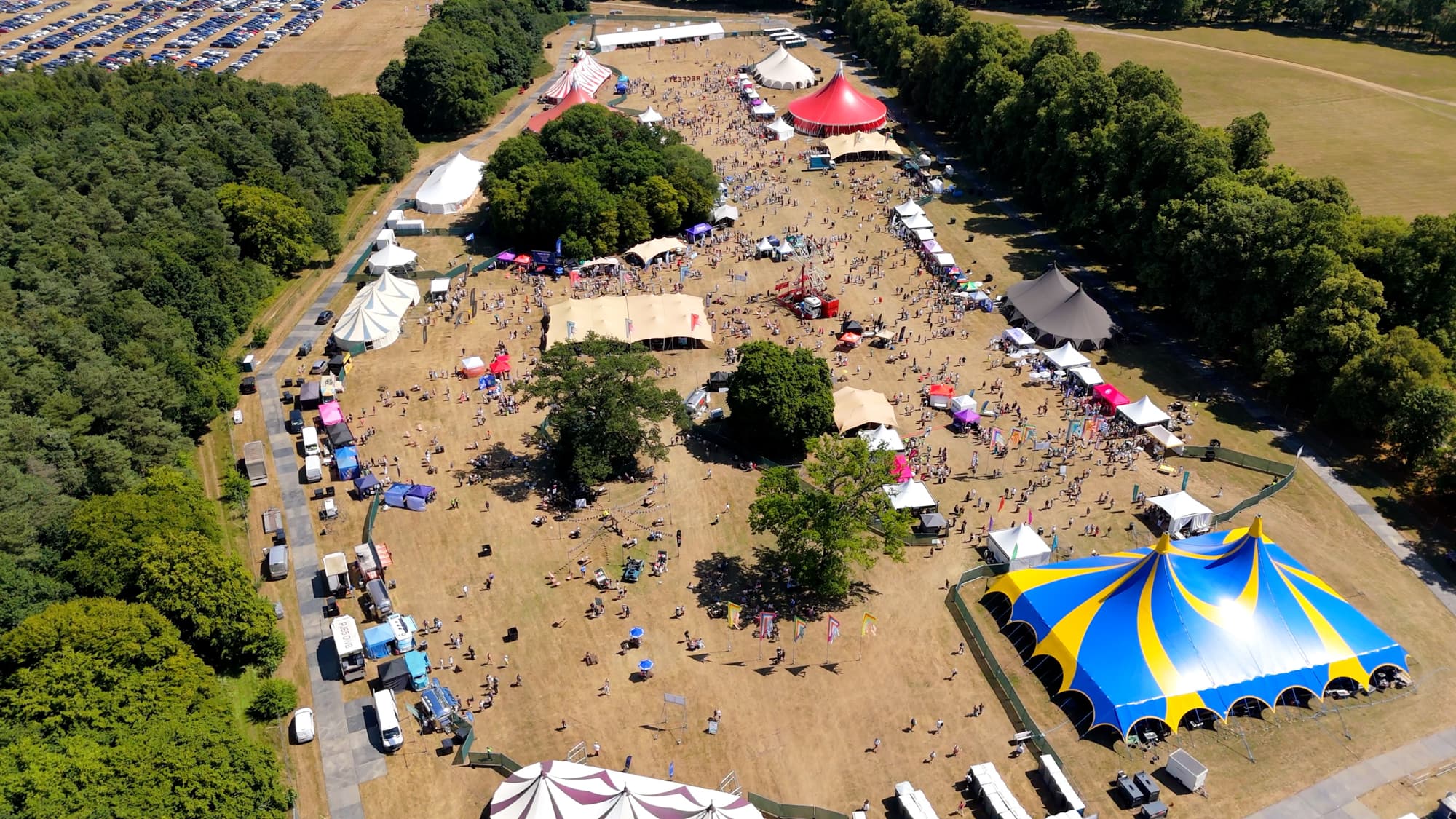 Aerial view of a previous RecFest UK event at Knebworth Park, with festival tents and attendees.
