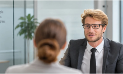 Two people speaking during a face-to-face interview