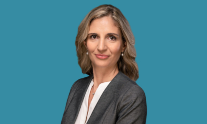 Elisa Mallis of the Center for Creative Leadership, pictured against a teal background.