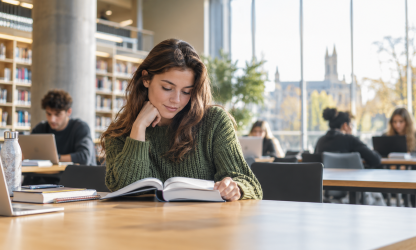 University student studying in a library