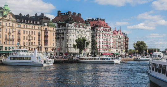Boats and historic waterfront buildings in Stockholm, Sweden